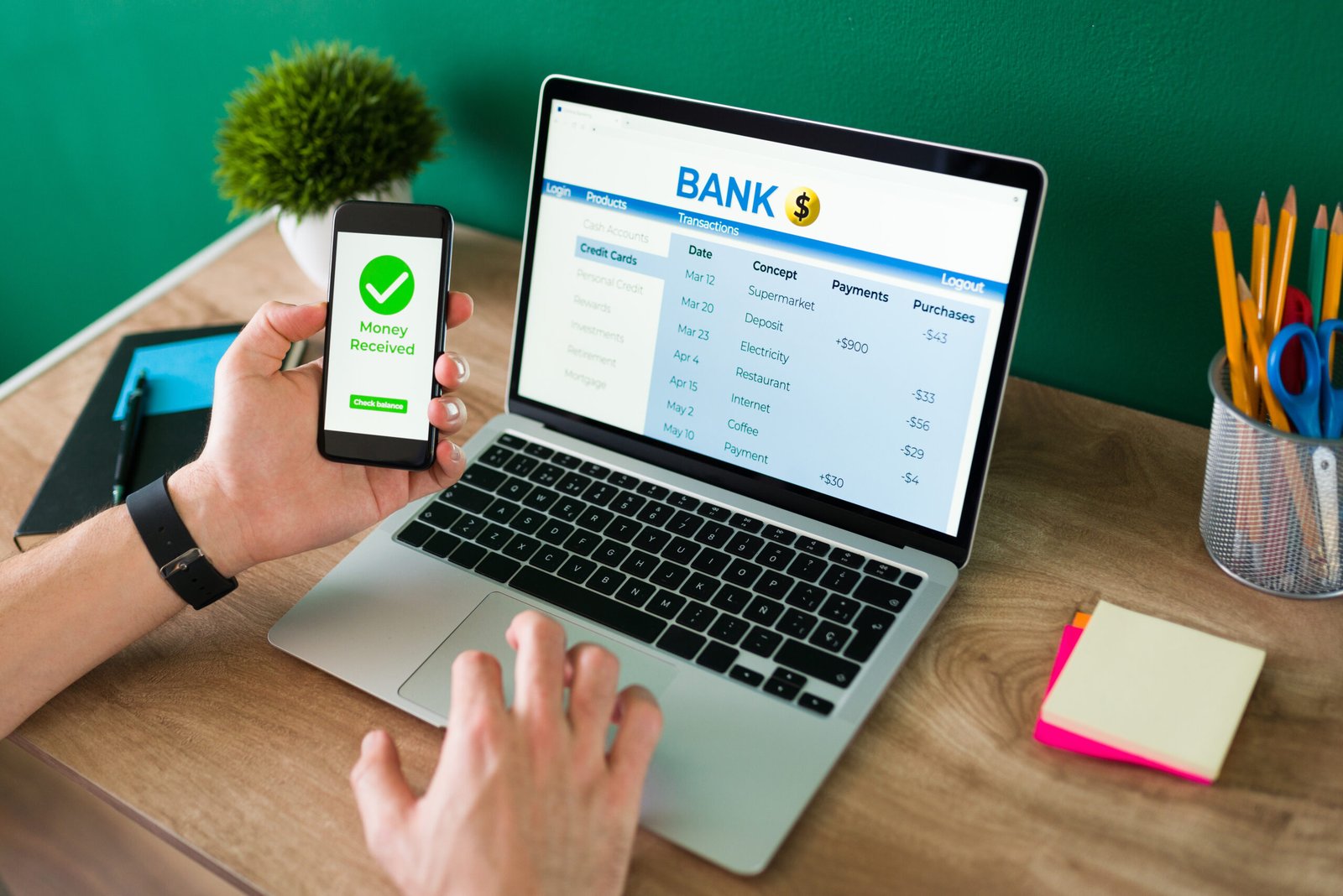 Wire Transfer Young Man Using His Smartphone Laptop Banking Transaction Some Payments 1 Scaled